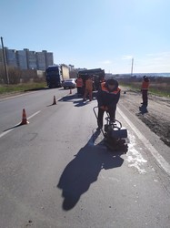 Як ремонтують Окружну дорогу навколо Харкова (ФОТО)