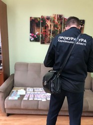 Корупція в органах поліції: на Харківщині затримано начальника сектору ГУНП (ФОТО)